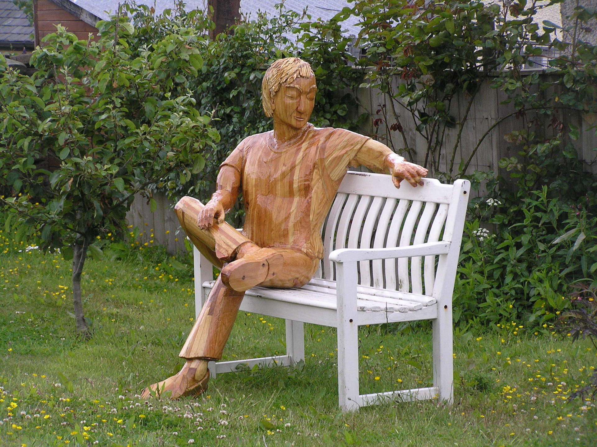 Wooden Man on a Bench